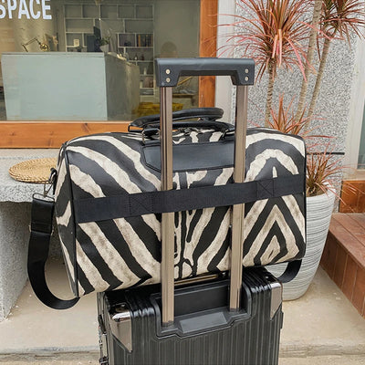 Large women's zebra pattern carry-on suitcase