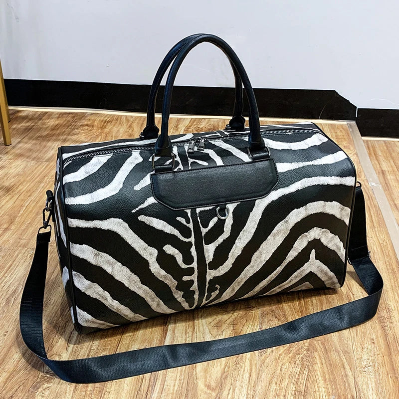 Large women's zebra pattern carry-on suitcase